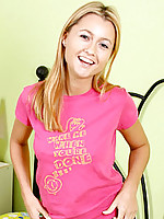 Cute teen in a really pink shirt sits up and gets ready to strip