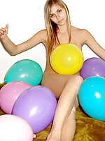 Katrina comfortably playing naked with this lovely colorful balloons